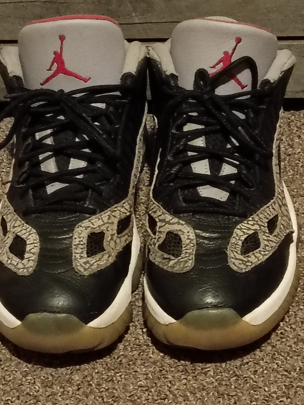 Jordan 11 Retro Low IE sneakers in Black, White and Red